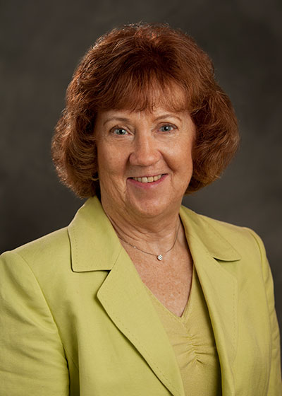 Dr. Horodynski smiling in a suit